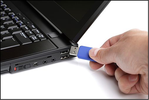Plugging Flash Drive into USB Port